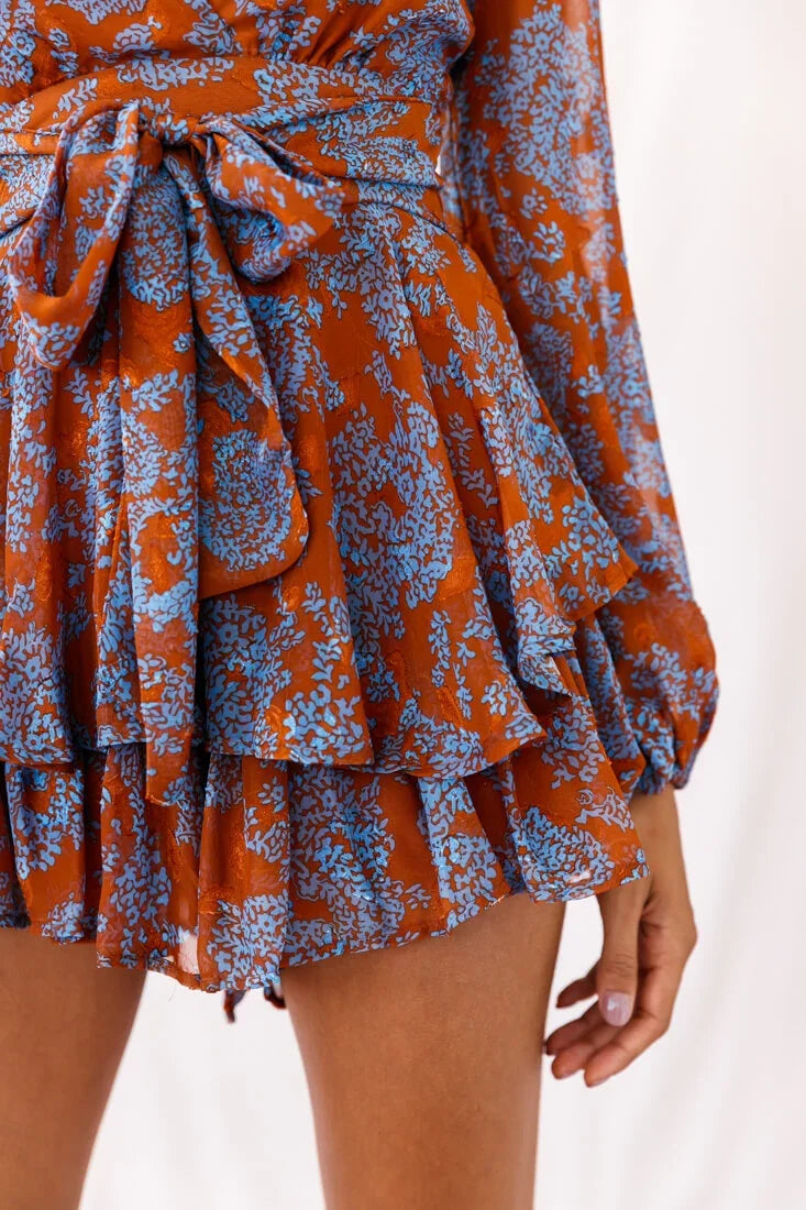 Maddox Fit & Flare Long Sleeve Floral Romper Tan