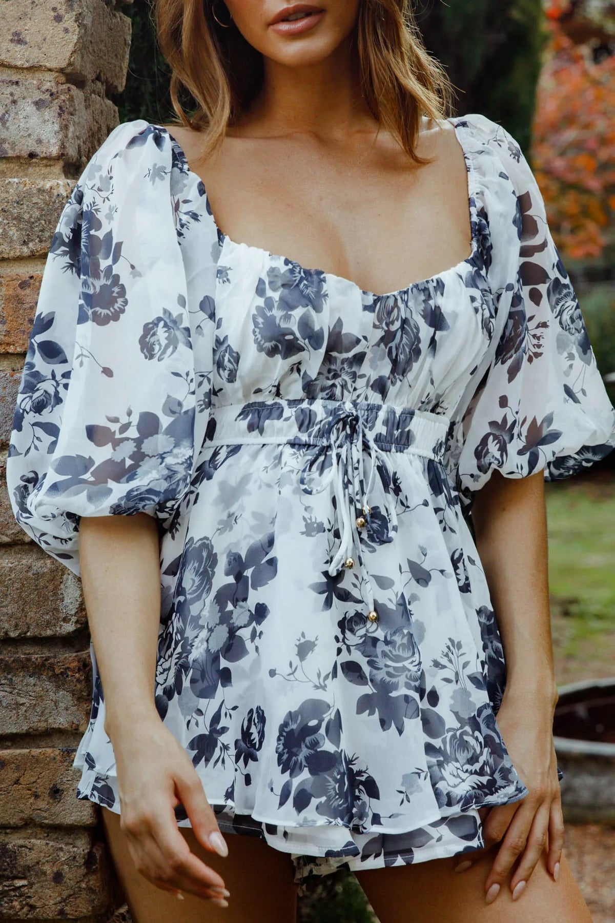 First Light Puff Sleeve Elasticated Waist Romper Floral Print Ink